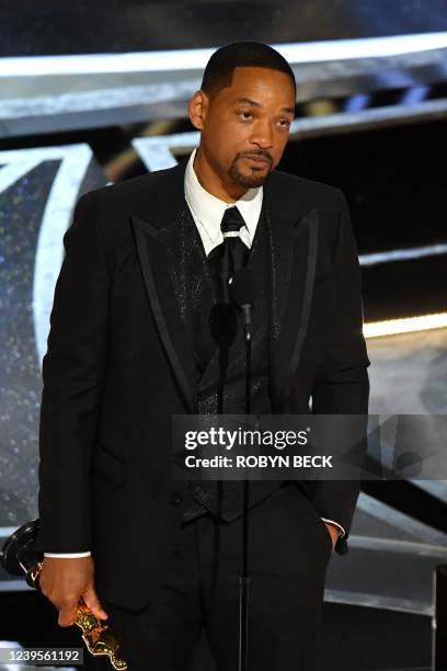 Actor Will Smith accepts the award for Best Actor in a Leading Role for "King Richard" onstage during the 94th Oscars at the Dolby Theatre in...