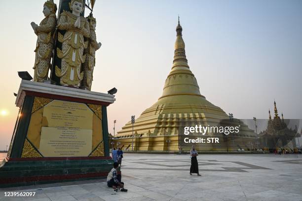 This photo taken on March 26, 2022 shows people visiting the Uppatasanti Pagoda in Naypyidaw.