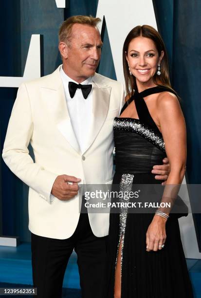 Actor Kevin Costner and his wife Christine Baumgartner attend the 2022 Vanity Fair Oscar Party following the 94th Oscars at the The Wallis Annenberg...