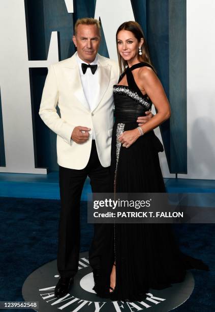 Actor Kevin Costner and his wife Christine Baumgartner attend the 2022 Vanity Fair Oscar Party following the 94th Oscars at the The Wallis Annenberg...