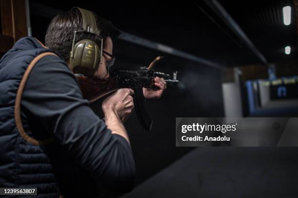 Ukrainian civilians receive weapons training at the Brno shooting range free of charge in Brno, Czech Republic on March 27, 2022. 120 people have...