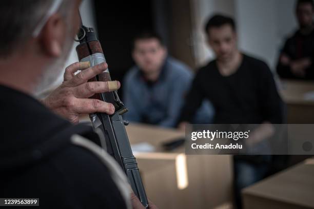 Ukrainian civilians receive weapons training at the Brno shooting range free of charge in Brno, Czech Republic on March 27, 2022. 120 people have...