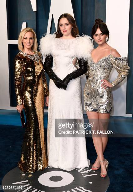 Canadian actress Amy Forsyth , US actress Marlee Matlin and British actress Emilia Jones attends the 2022 Vanity Fair Oscar Party following the 94th...