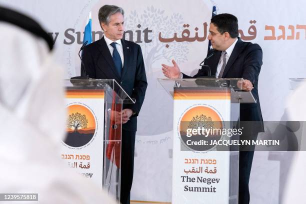 Secretary of State Antony Blinken listens as Morocco's Foreign Minister Nasser Bourita speaks during the Negev Summit, in Sde Boker, Israel on March...