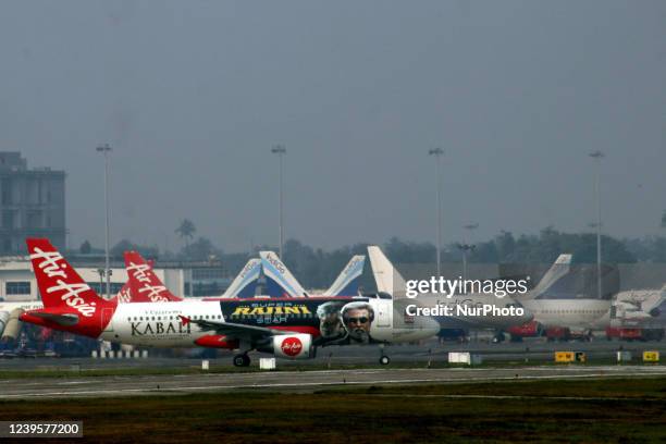 An Air Asia and Indigo aircrafts parked at the Netaji Subhash Chandra Bose International Airport in Kolkata,India on March 29,2022.