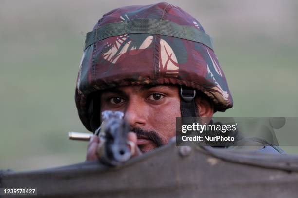 Indian army soldiers take position during CASO Cordon And Search Operation drill in South Kashmir's Kulgam District, Jammu and Kashmir, India on 28...