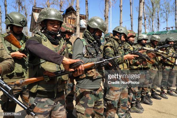 Indian army soldiers load their weapons before CASO Cordon And Search Operation drill in South Kashmir's Kulgam District, Jammu and Kashmir, India on...