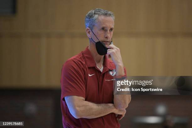 Pennsylvania Quakers head coach Steve Donahue observes the action during the semifinal college basketball game of the Ivy League Tournament between...