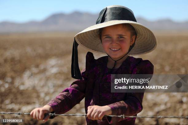 Mennonite Katharina Herder poses for a picture at the Mennonite village of Sabinal in Chihuahua state, Mexico, on March 5, 2022. - A hundred years...