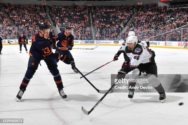 Jesse Puljujarvi of the Edmonton Oilers takes a shot past Anton Stralman of the Arizona Coyotes on March 28, 2022 at Rogers Place in Edmonton,...