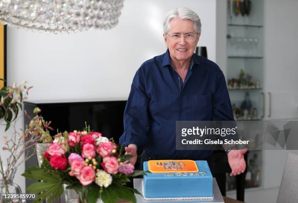 Image has been retouched) Frank Elstner poses with a birthday cake with inscription reading "Wetten daß? ich 80 bin" during a photo shoot prior to...