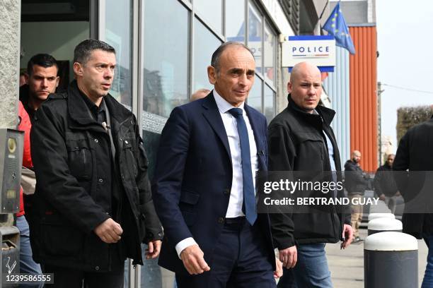 French far-right Reconquete! party President and presidential candidate Eric Zemmour walks out of a police station during a visit to Sevran, a...