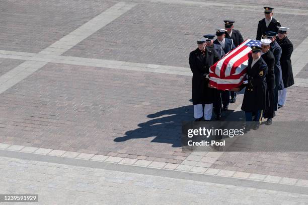 An honor guard carries the casket of Rep. Donald Edwin Young at the US Capitol on March 29, 2022 in Washington, DC. Rep. Don Young , who died March...