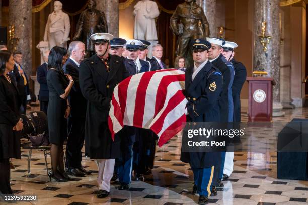 Military honor guard carries the casket of Rep. Don Young to lie in state in Statuary Hall at the U.S. Capitol on March 29, 2022 in Washington, DC....