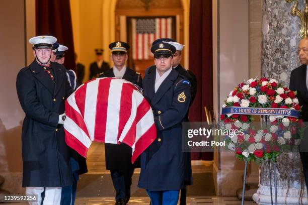 Military honor guard carries the casket of Rep. Don Young to lie in state in Statuary Hall at the U.S. Capitol on March 29, 2022 in Washington, DC....