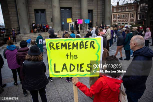 Quincy, MA People gather at a rally to demand the return of the Abigail Adams statue back to Quincy City Hall in Quincy, MA on March 26, 2022. The...