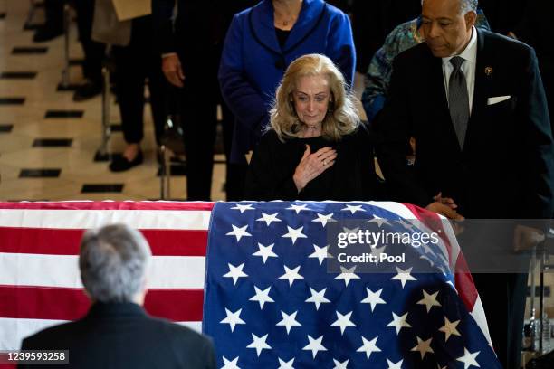 Anne Garland Walton, the widow of Rep. Don Young pays her respect at the casket as Young lies in state at the U.S. Capitol on March 29, 2022 in...