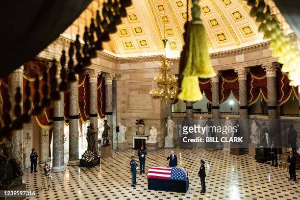 President Joe Biden pays his respects to Rep. Don Young as he lies in state in Statuary Hall at the US Capitol in Washington, DC, on March 29, 2022.
