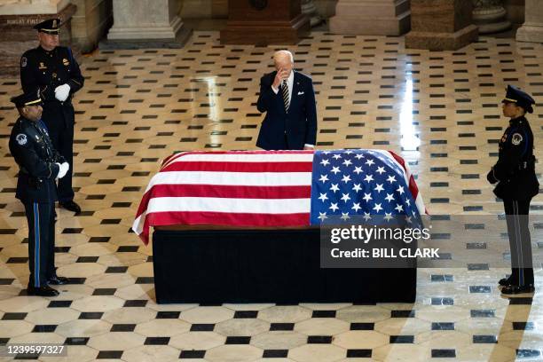 President Joe Biden pays his respects to Rep. Don Young as he lies in state in Statuary Hall at the US Capitol in Washington, DC, on March 29, 2022.