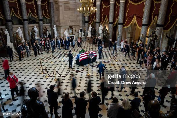 Visitors file past a flag-draped casket of Rep. Don Young as he lies in state in Statuary Hall at the U.S. Capitol March 29, 2022 in Washington, DC....