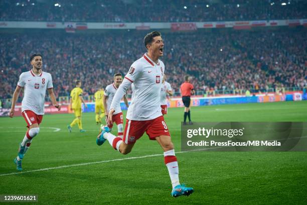 Robert Lewandowski of Poland celebrates scoring the first goal of his team during the 2022 FIFA World Cup Qualifier knockout round play-off match...