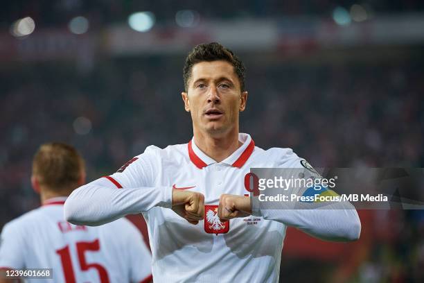 Robert Lewandowski of Poland celebrates scoring the first goal of his team during the 2022 FIFA World Cup Qualifier knockout round play-off match...