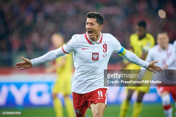 Robert Lewandowski of Poland celebrates scoring the first goal of his team during the 2022 FIFA World Cup Qualifier knockout round play-off match...