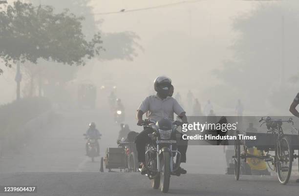 Heavy smog seen in area surrounding Ghazipur landfill in morning after fire continues on the second day since Monday afternoon on March 29, 2022 in...