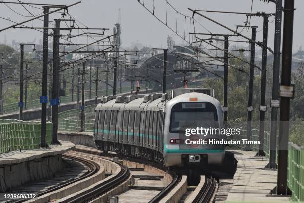 Metro train approaches the newly inaugurated interchange station connecting Pink Line with Green Line of Delhi Metro network at Punjabi Bagh West on...