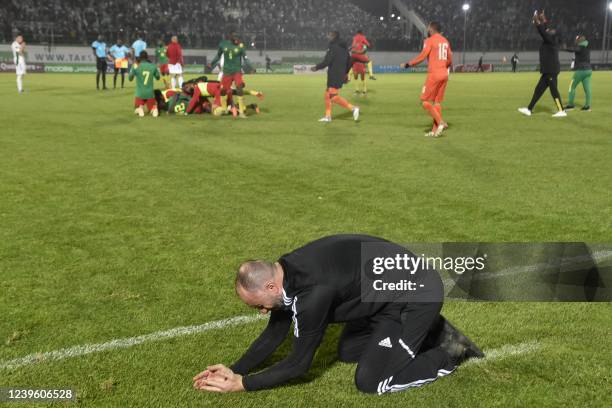 Algeria's coach Djamel Belmadi reacts to their defeat during the second leg of the 2022 Qatar World Cup African Qualifiers football match between...