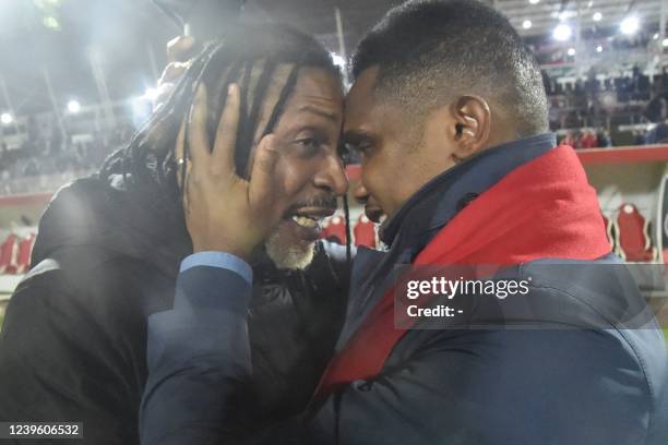 Samuel Eto'o, president of the Cameroonian Football Federation, hugs Cameroon's coach Rigobert Song after qualifying to the 2022 Qatar World Cup...