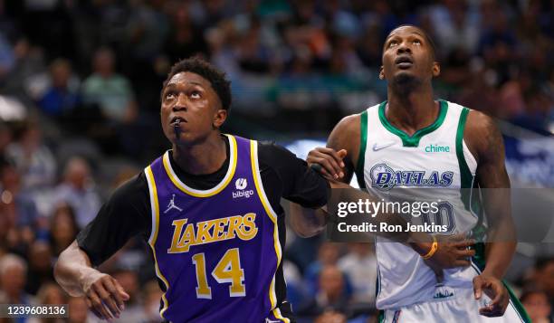 Stanley Johnson of the Los Angeles Lakers and Dorian Finney-Smith of the Dallas Mavericks fight for position in the first half at American Airlines...