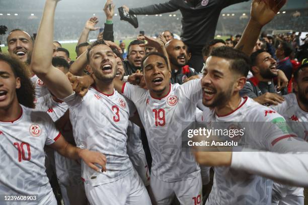 Players of Tunisia celebrate after beating the team Mali at the end of the second leg of the FIFA World Cup African Qualifiers 3rd round match...