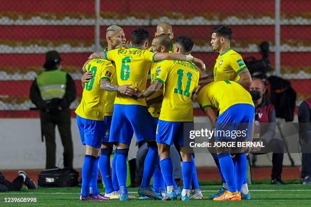 Brazil's players celebrate after scoring against Bolivia during their South American qualification football match for the FIFA World Cup Qatar 2022...