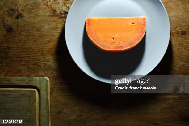 organic mimolette - mimolette stock pictures, royalty-free photos & images