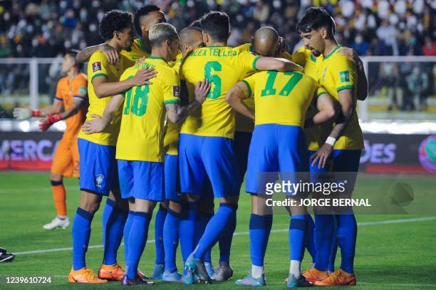 Brazil's players celebrate after scoring against Bolivia during their South American qualification football match for the FIFA World Cup Qatar 2022...