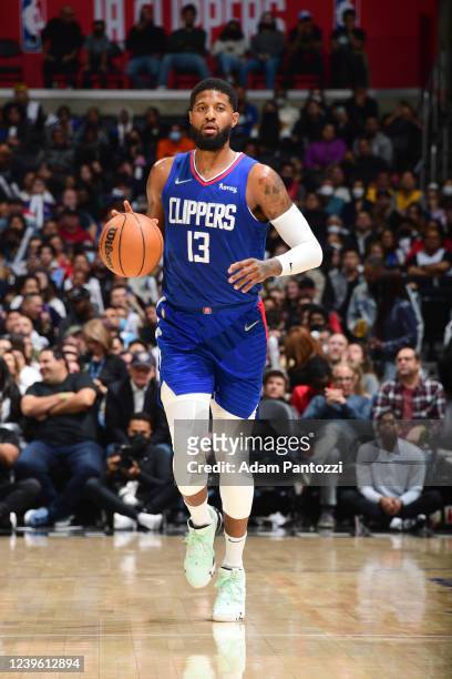 Paul George of the LA Clippers dribbles the ball during the game against the Utah Jazz on March 29, 2022 at Crypto.Com Arena in Los Angeles,...