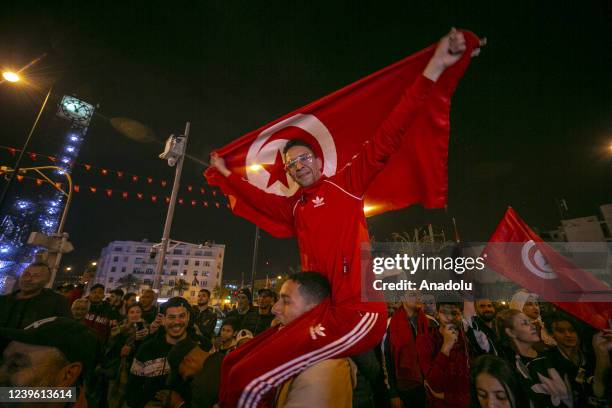 Fans gather to celebrate at Habib Bourguiba Street after Tunisia wins the FIFA World Cup African Qualifiers 3rd round match against Mali in Tunis,...