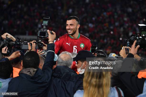 Romain Saiss of Morocco celebrates his victory at the end of the FIFA World Cup African Qualifiers 3rd round match between Morocco and Democratic...
