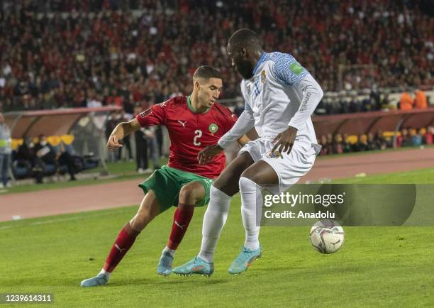 Achraf Hakimi of Morocco in action against Arthur Masuaku of Democratic Republic of the Congo during the FIFA World Cup African Qualifiers 3rd round...