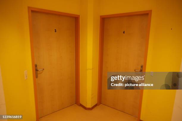 March 2022, North Rhine-Westphalia, Stapelage: Closed are two room doors in the house of the Free Evangelical Christian Church Stapelage, where...