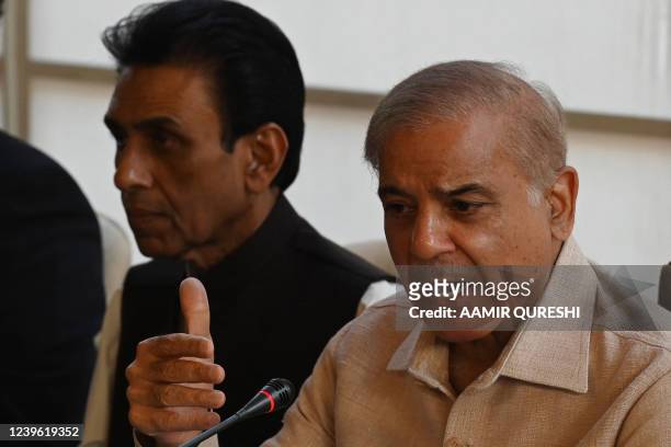 Pakistani opposition leader Shahbaz Sharif , and along with a government coalition partner and leader of Muttahida Qaumi Movement , Khalid Maqbool...