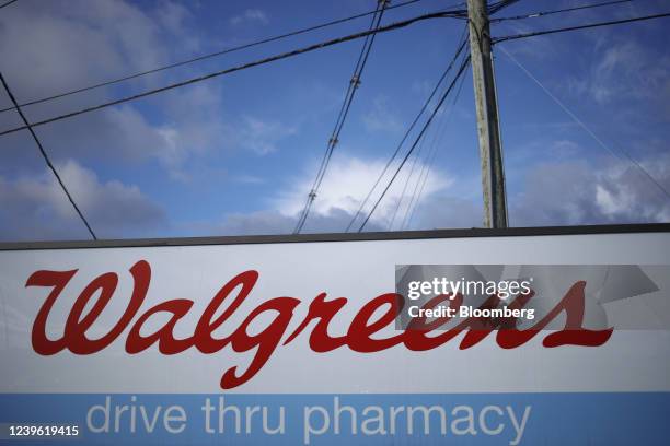 Signage for a Walgreens pharmacy drive thru location in Louisville, Kentucky, U.S., on Thursday, March 24, 2022. Walgreens Boots Alliance Inc. Is...