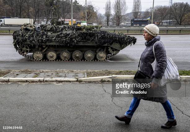 Ukrainian military vehicles and soldiers are seen on the road to Irpin which is just near the capital Kyiv, Ukraine on March 30, 2022. While calm...