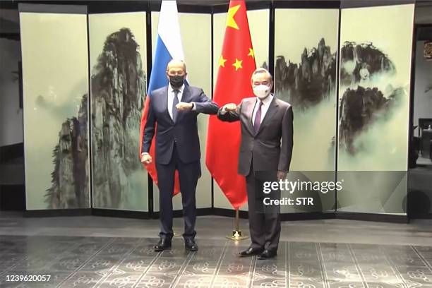 This screengrab taken on March 30, 2022 from video by state broadcaster China Central Television via AFPTV shows Russian Foreign Minister Sergei...