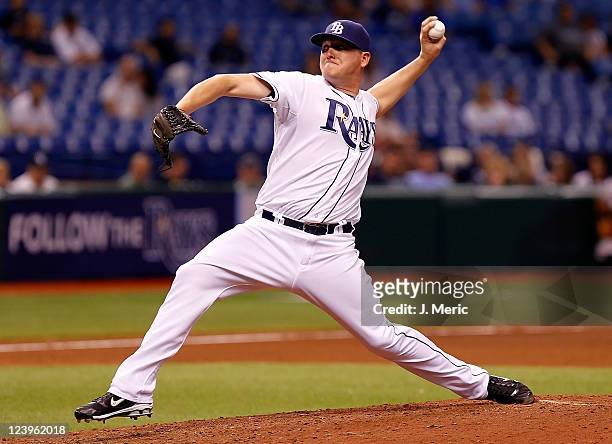Pitcher Jake McGee of the Tampa Bay Rays pitches against the Texas Rangers during the game at Tropicana Field on September 6, 2011 in St. Petersburg,...