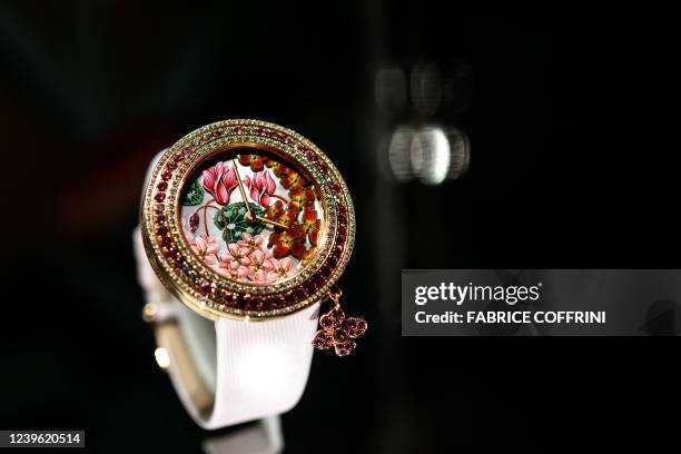 Watch by French luxury jewelry, watch, and perfume company Van Cleef & Arpels is displayed at the opening day of the Watches and Wonders Geneva show,...