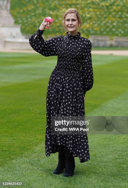 Genevieve Ballard, better known as Alison Moyet, poses after being made an MBE by the Princess Royal during an investiture ceremony at Windsor Castle...