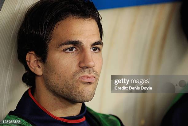 Cesc Fabragas of Spain looks out from the bench bwfore the EURO 2012 Qualifier match between Spain and Liechtenstein at estadio Las Gaunas on...