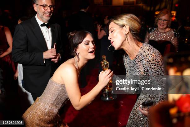 March 27, 2022: Director Sian Heder and actress Emilia Jones celebrate Heders Oscar trophy for Adapted Screenplay, while surrounded by their CODA...